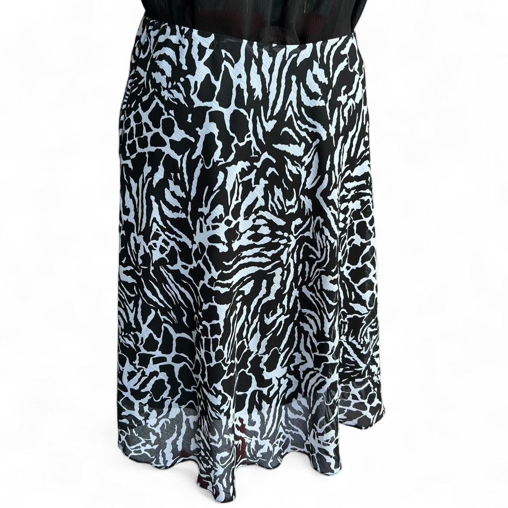 Covington black & white animal print midi skirt with ruffle detail size medium